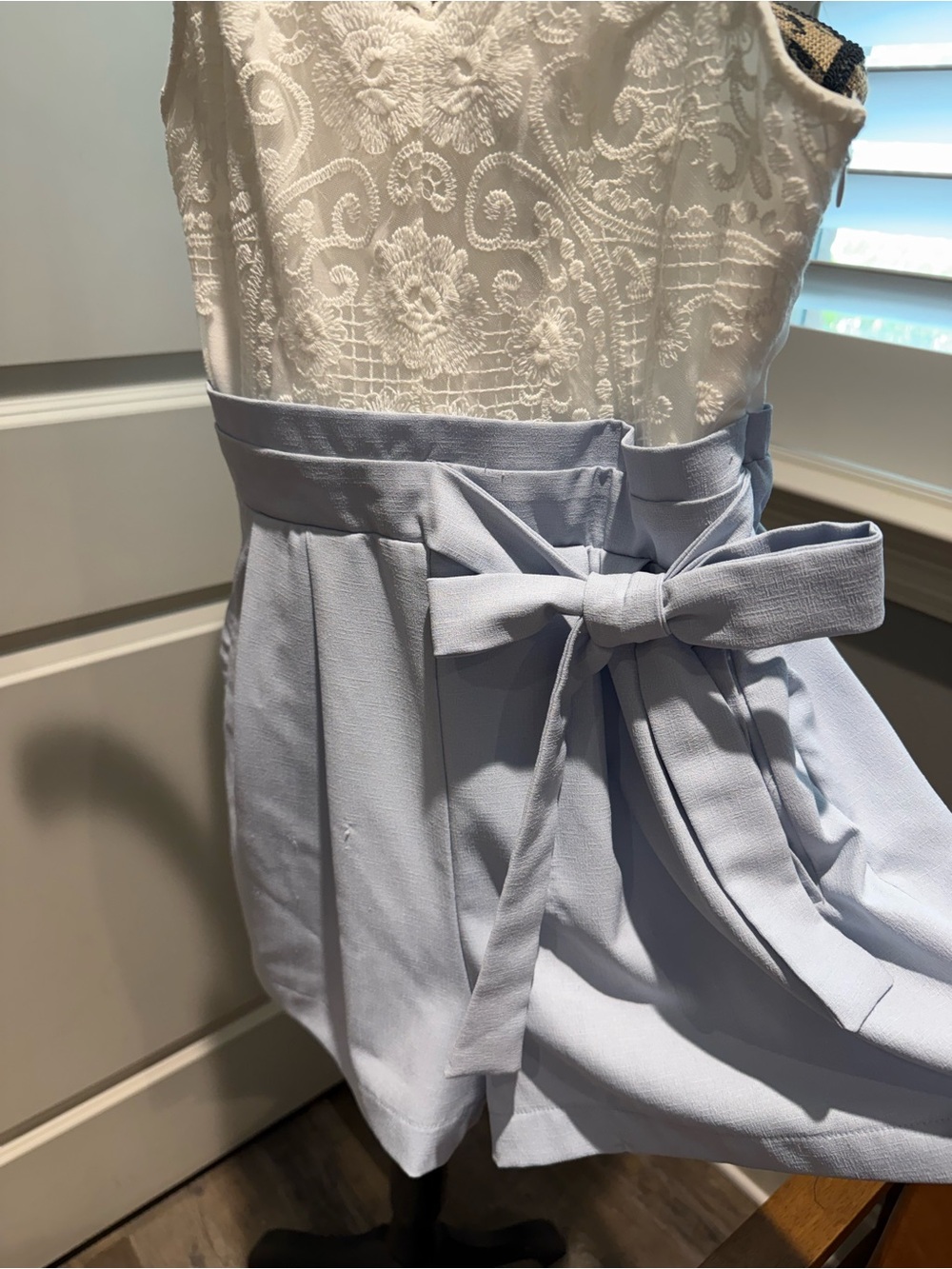 the clothing company White Lace Bodice Light Blue Tie-Waist Romper w/Pockets - Picture 3 of 6